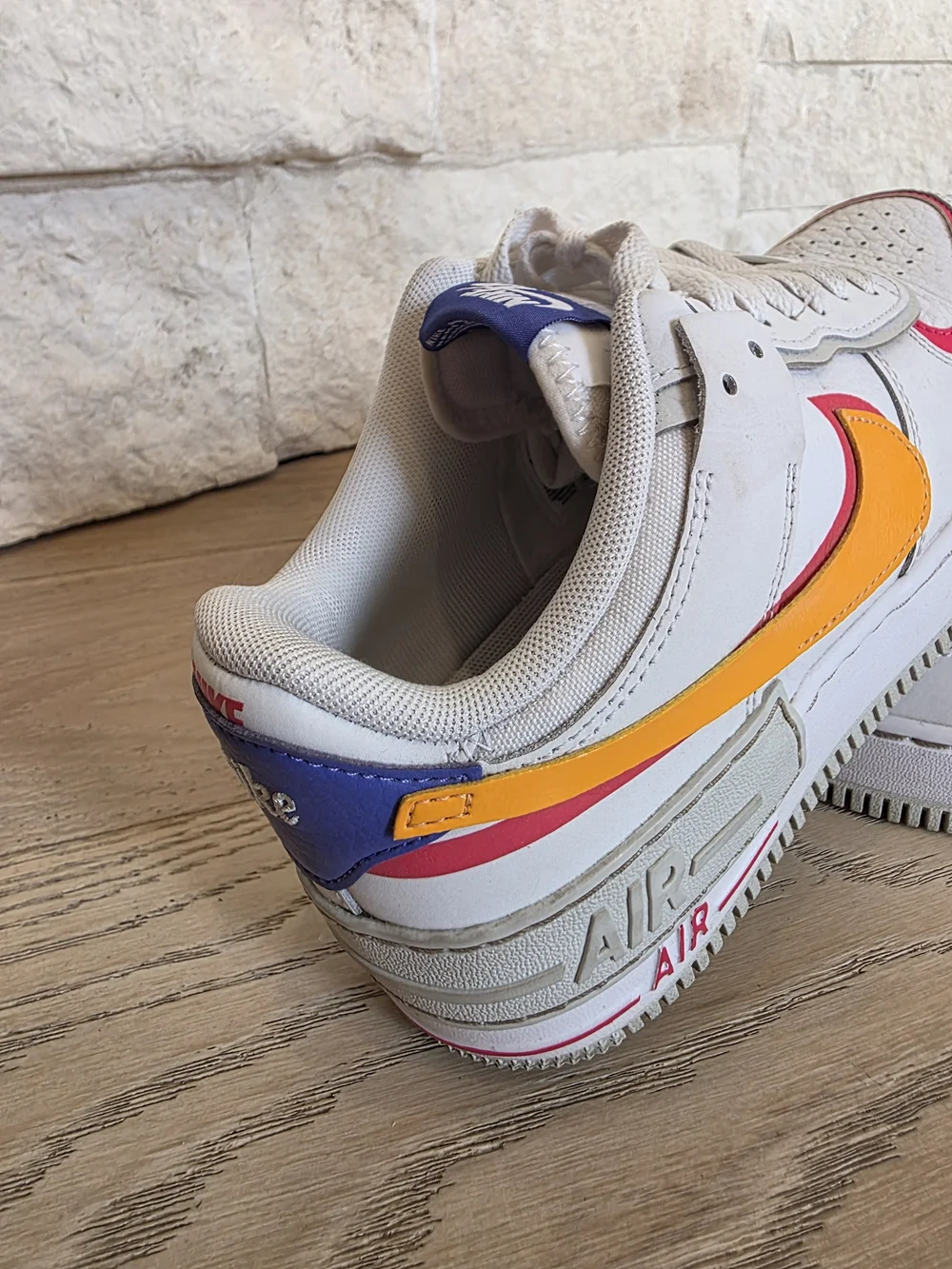 Nike Womens White Sneakers with Yellow & Pink & Purple Accents